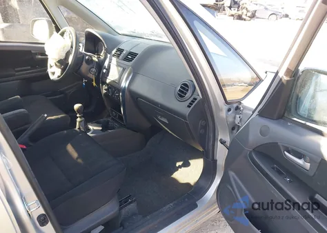 2010 Suzuki Sx4 Le/Le Popular z USA, uszkodzony, nr VIN JS2YC5A29A6300874